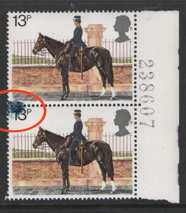 GB 1979 Police 13p um pair with prominent splodge of blue-black on value